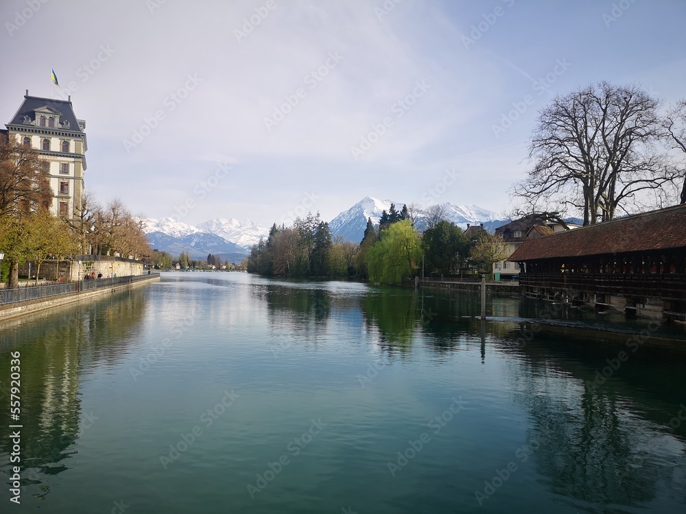 lake in the village and alps in the background lake in the village and alps in the background