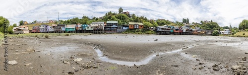 Panorama of the Palafitos de Pedro Montt - colorful stilt houses on Chiloé (Isla Grande de Chiloé) in Chile  © freedom_wanted