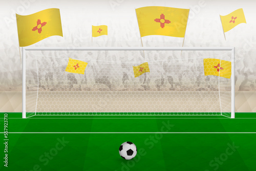New Mexico football team fans with flags of New Mexico cheering on stadium, penalty kick concept in a soccer match.
