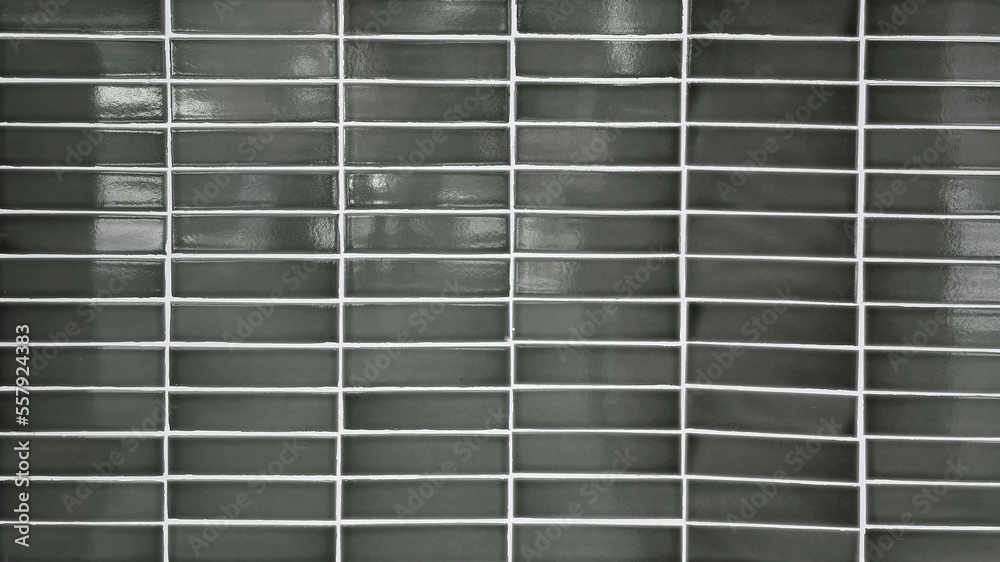 close up dark grey mosaic wall tiles in modern style. real antique ceramic interior wall tiles. wall tiles background for modern, simple, bold, fresh, soft, industrial tone concept. close up dark grey mosaic wall tiles in modern style. real antique ceramic interior wall tiles. wall tiles background for modern, simple, bold, fresh, soft, industrial tone concept.