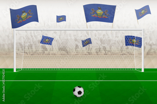 Pennsylvania football team fans with flags of Pennsylvania cheering on stadium, penalty kick concept in a soccer match.