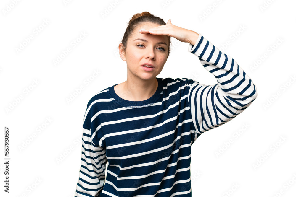 Young blonde woman over isolated chroma key background looking far away with hand to look something Young blonde woman over isolated chroma key background looking far away with hand to look something
