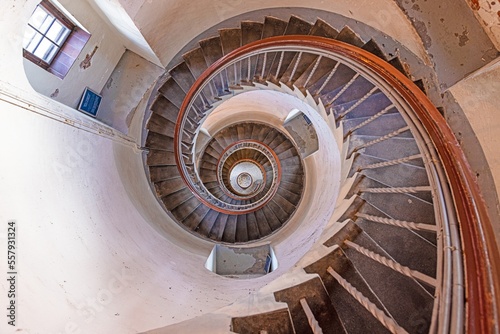 Vertical view from top of round spiral staircase in lighthouse