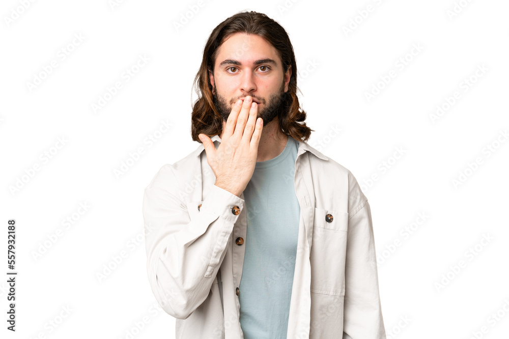 Young handsome man over isolated chroma key background covering mouth with hand Young handsome man over isolated chroma key background covering mouth with hand
