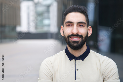 Photography Portrait of Arab Arabian young handsome happy muslim bearded man with beard in c
