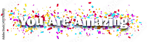 You are amazing sign on colorful cut ribbon confetti background.