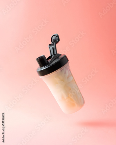 Foto Protein shaker bottle in air