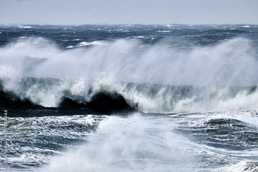 waves breaking on the rocks waves breaking on the rocks