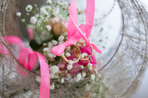 Two wedding rings in a basket. High quality photo.  photo