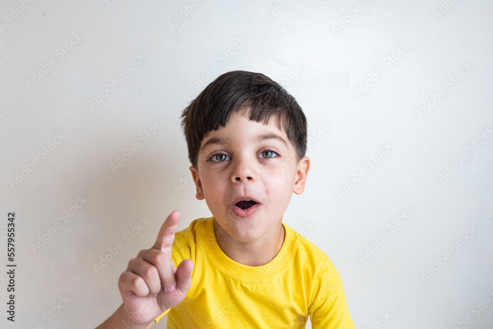 Cute and happy boy with yellow t-shirt Cute and happy boy with yellow t-shirt