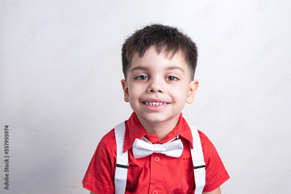 Cute boy in classic clothes on white background Cute boy in classic clothes on white background