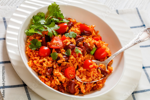 Fototapeta Naklejka Na Ścianę i Meble -  jollof rice with red beans, tomato, spices