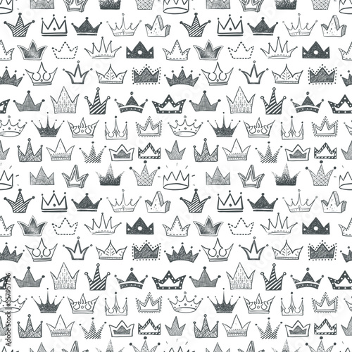 Seamless backrgound with black doodle crowns. Can be used for wallpaper, pattern fills, textile, web page background, surface textures.