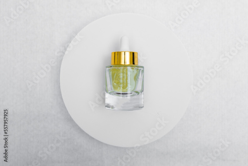 Wallpaper Mural Trendy Beauty concept of Facial Serums, Natural Essential Oil in cosmetic bottles with dropper and bright sunligth shadow on white background. Torontodigital.ca