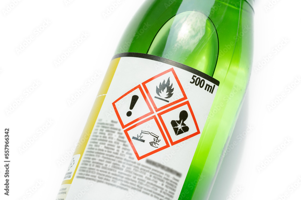 A green bottle of highly corrosive flammable chlorinated rubber nitro