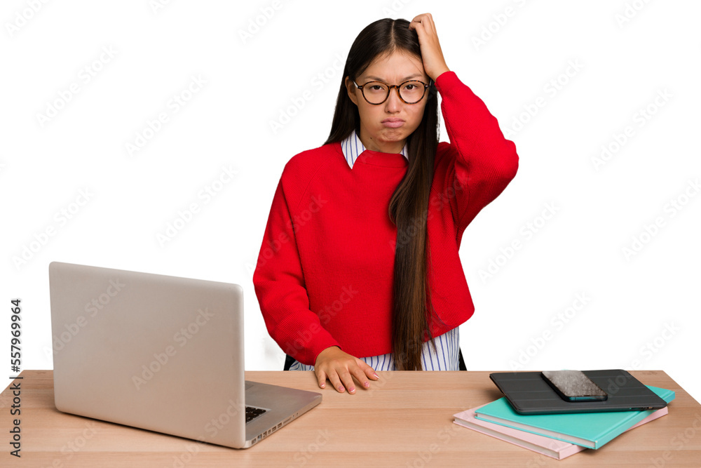 Young student asian woman in a workplace with a laptop isolated tired and very sleepy keeping hand on head. Young student asian woman in a workplace with a laptop isolated tired and very sleepy keeping hand on head.
