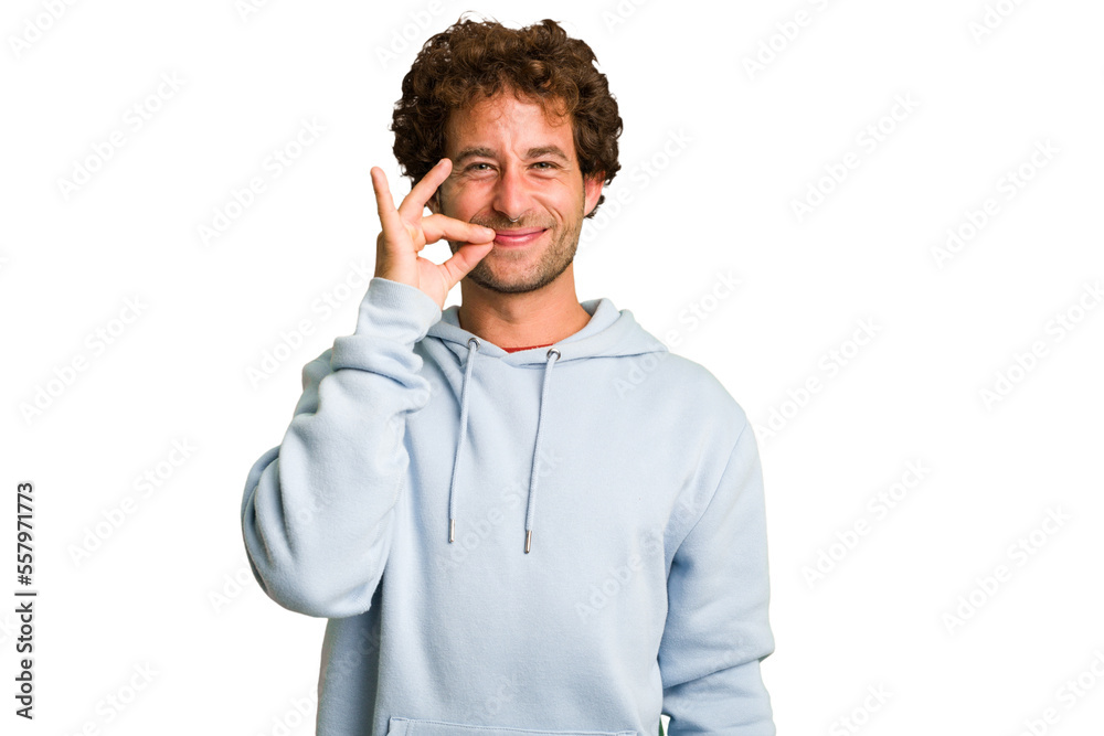 Young curly smart caucasian man cut out isolated with fingers on lips keeping a secret. Young curly smart caucasian man cut out isolated with fingers on lips keeping a secret.