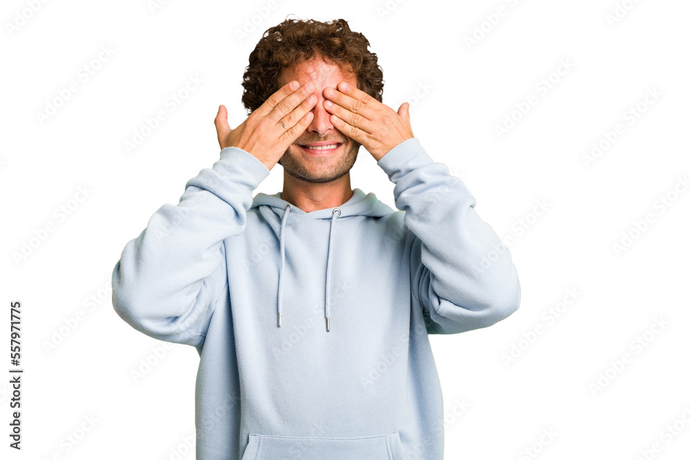 Young curly smart caucasian man cut out isolated afraid covering eyes with hands. Young curly smart caucasian man cut out isolated afraid covering eyes with hands.