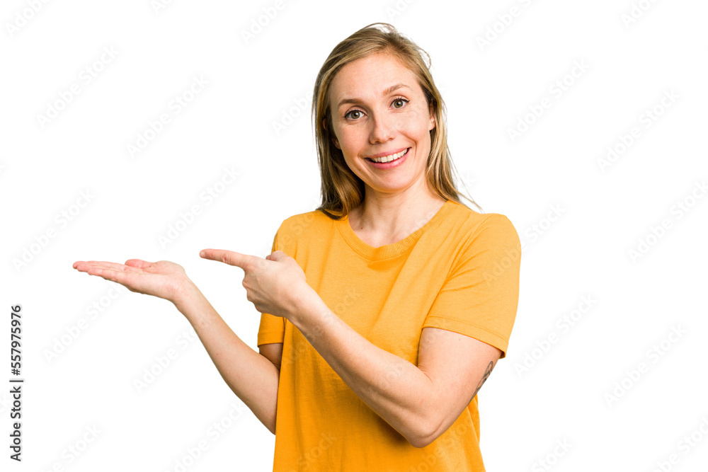 Young caucasian woman cutout isolated excited holding a copy space on palm. Young caucasian woman cutout isolated excited holding a copy space on palm.
