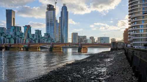 View of St George's wharf construction development over vauxhall bridge london and river thames at low tide photo