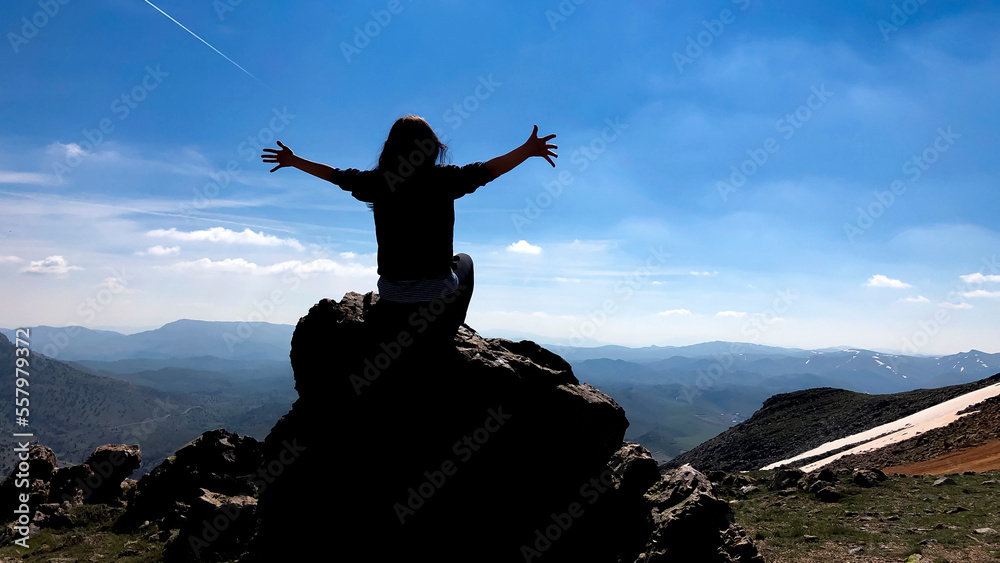 lady in yoga position on top of mountains and therapy moment