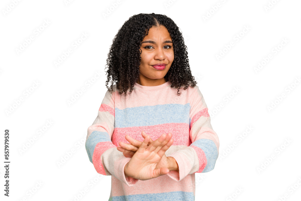 Young african american woman with curly hair cut out isolated doing a denial gesture Young african american woman with curly hair cut out isolated doing a denial gesture