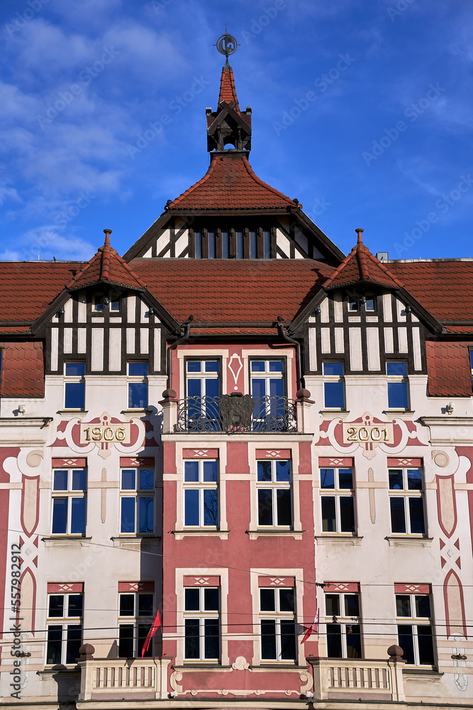 Decorative facade of a historic tenement house in the city of Poznan