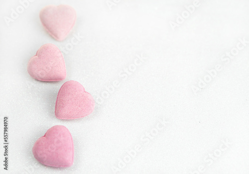 Valentines day beauty spa concept , pastel pink hearts on  glitter  background  with copy space .