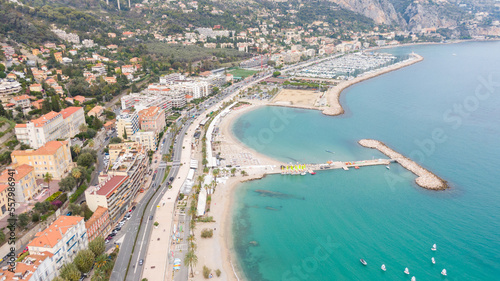 Aerial view on coast, marina and buildings in old Town Menton, France. Drone photo. High angle view of town © Maciej