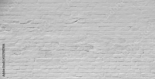 Urban white street brick wall background or texture