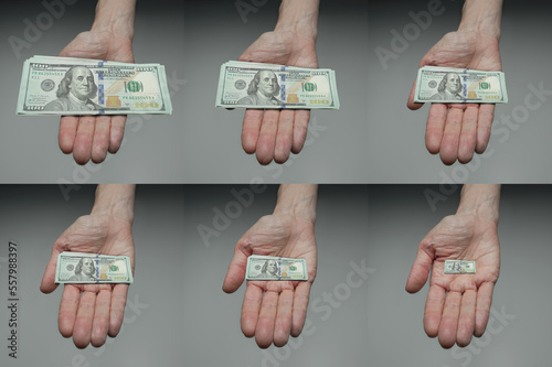 100 dollar bill shrinking over time  in palm of hand photo