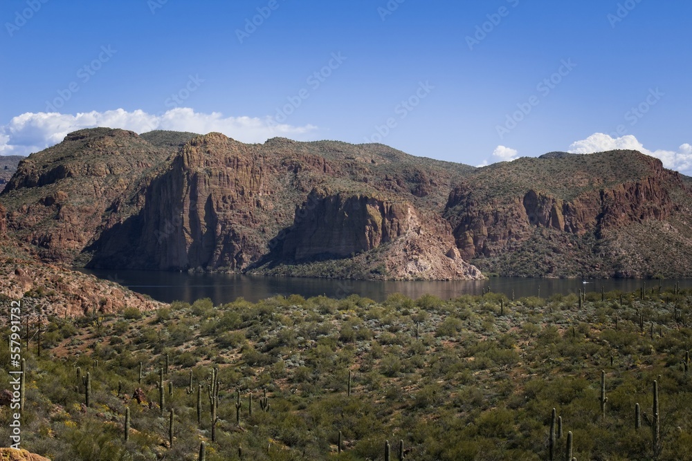 Canyon lake and jagged rock mountain near the small town of Tortilla Flats, Arizona.