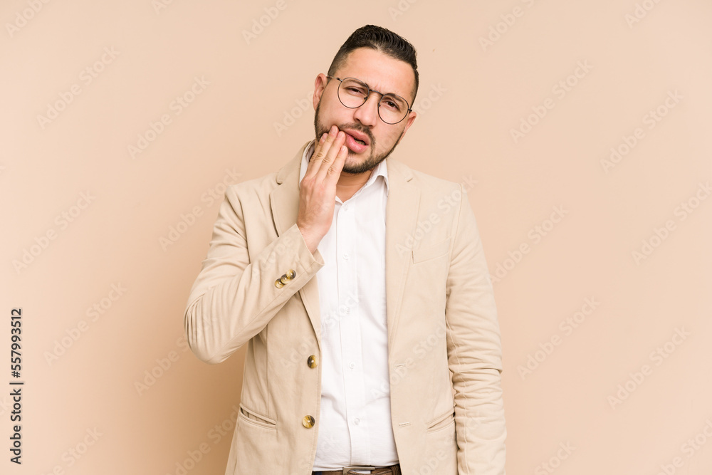 Adult latin business man cut out isolated having a strong teeth pain, molar ache. Adult latin business man cut out isolated having a strong teeth pain, molar ache.