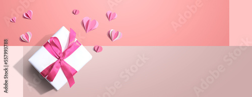 Valentines day or Appreciation theme with a gift box and paper craft hearts © Tierney