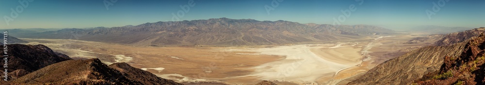 Panorama view from hill to desert salt Death Valley in Viewpoint on hill to desert salt valley in america at blue sunny day