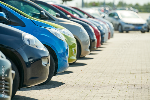 row of used cars. Rental or automobile sale services