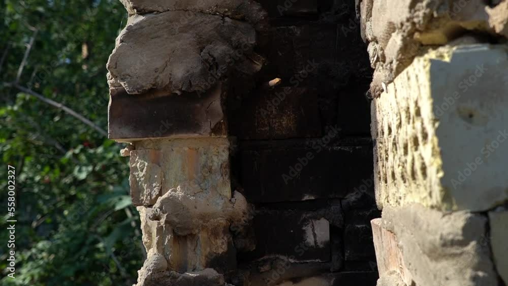 Construction debris from demolished buildings and bricks left over from a destroyed house. Cleaning up territories from destruction Construction debris from demolished buildings and bricks left over from a destroyed house. Cleaning up territories from destruction