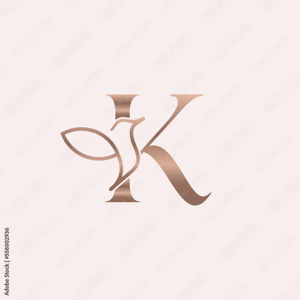 golden bird logo beauty letter K golden bird logo beauty letter K