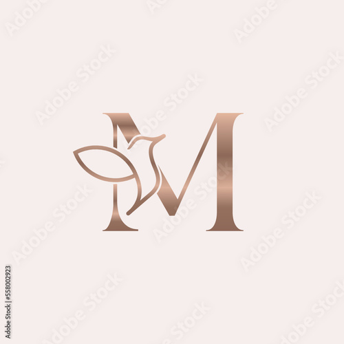golden bird logo beauty letter M