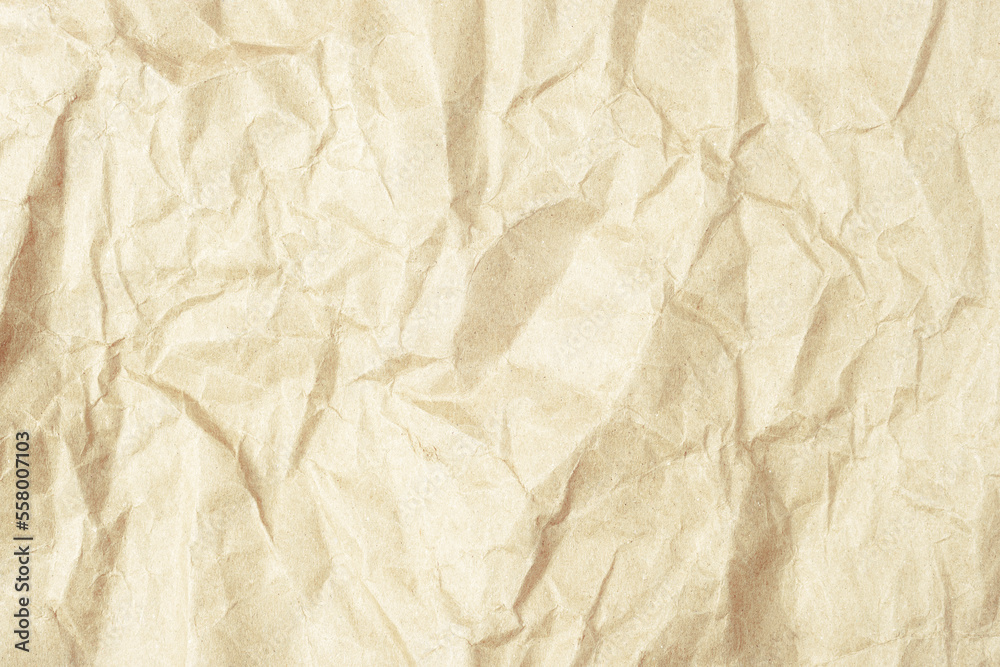 Obraz premium Light brown crumpled kraft paper texture, background