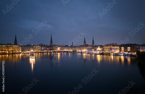 Panoramic view over the city center of Hamburg by night - CITY OF HAMBURG, GERMANY - DECEMBER 23, 2022