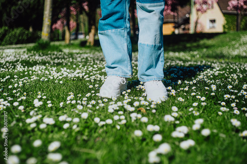 person walking on the grass, spring concept