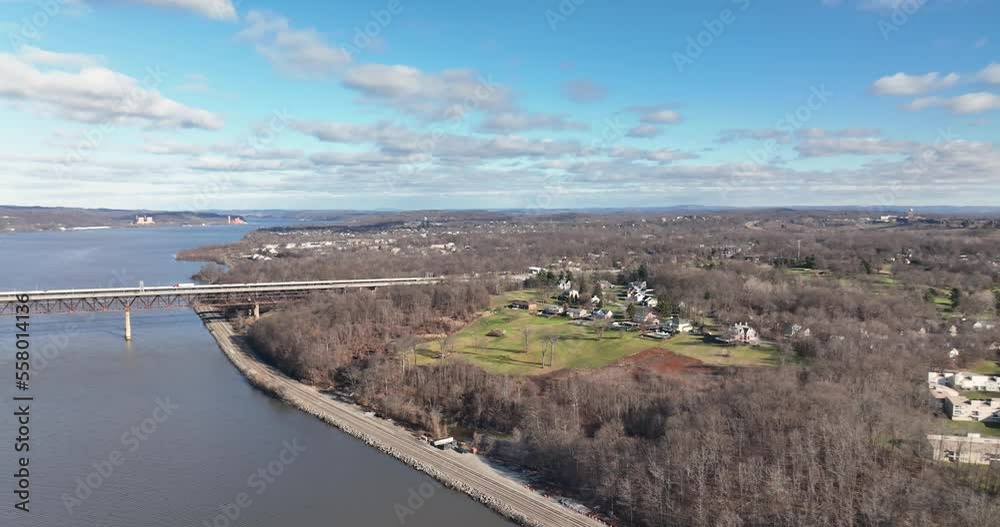 Mid-morning winter aerial video of Beacon New York along the eastern side of the Hudson River. Mid-morning winter aerial video of Beacon New York along the eastern side of the Hudson River.