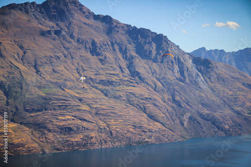 Qeenstown paragliding breathtaking stunning views, beautiful scenery and landscape, mountains and lakes, South Island, New Zealand photo