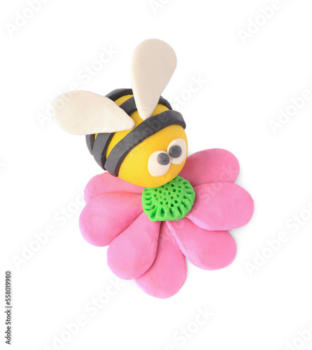 Bee with flower made from plasticine on white background. Children's handmade ideas