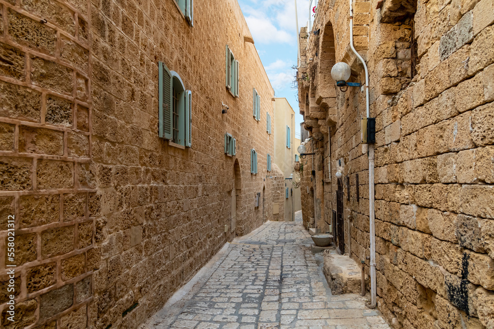 A narrow street in the historic medieval old town of Jaffa Israel.