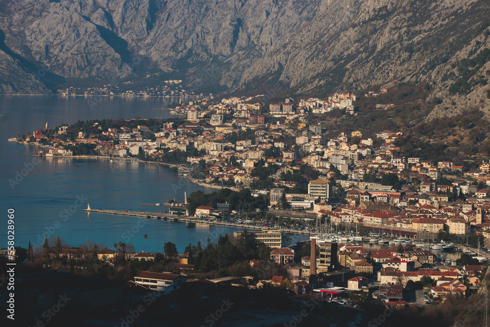 Obraz premium The Bay of Kotor, Beautiful aerial view of Boka Kotorska, with Kotor, Herceg Novi and Tivat municipalities in a sunny day, Adriatic sea and Dinaric Alps with Lovcen and Orjen mountains, Montenegro