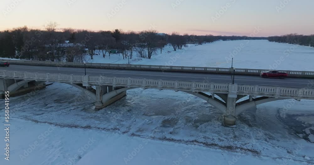 SUV On Ferry Street Bridge In Winter Champlin Minnesota - Drone Truck Left SUV On Ferry Street Bridge In Winter Champlin Minnesota - Drone Truck Left