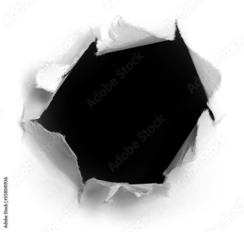 Ragged hole torn in ripped paper. Royalty high-quality free stock PNG image of Piece of torn, ripped squared grey paper hole. Torn slash, gun aperture design element isolated on transparent background photo