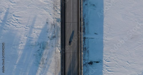 Drone Shot Flying Over 169 Bridge Looking Down In Winter Champlin Minnesota photo